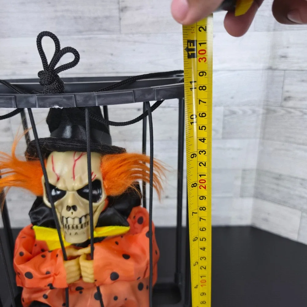 Halloween Animated Skeleton Clown in Cage Hanging Prop Orange Black Skull Decor